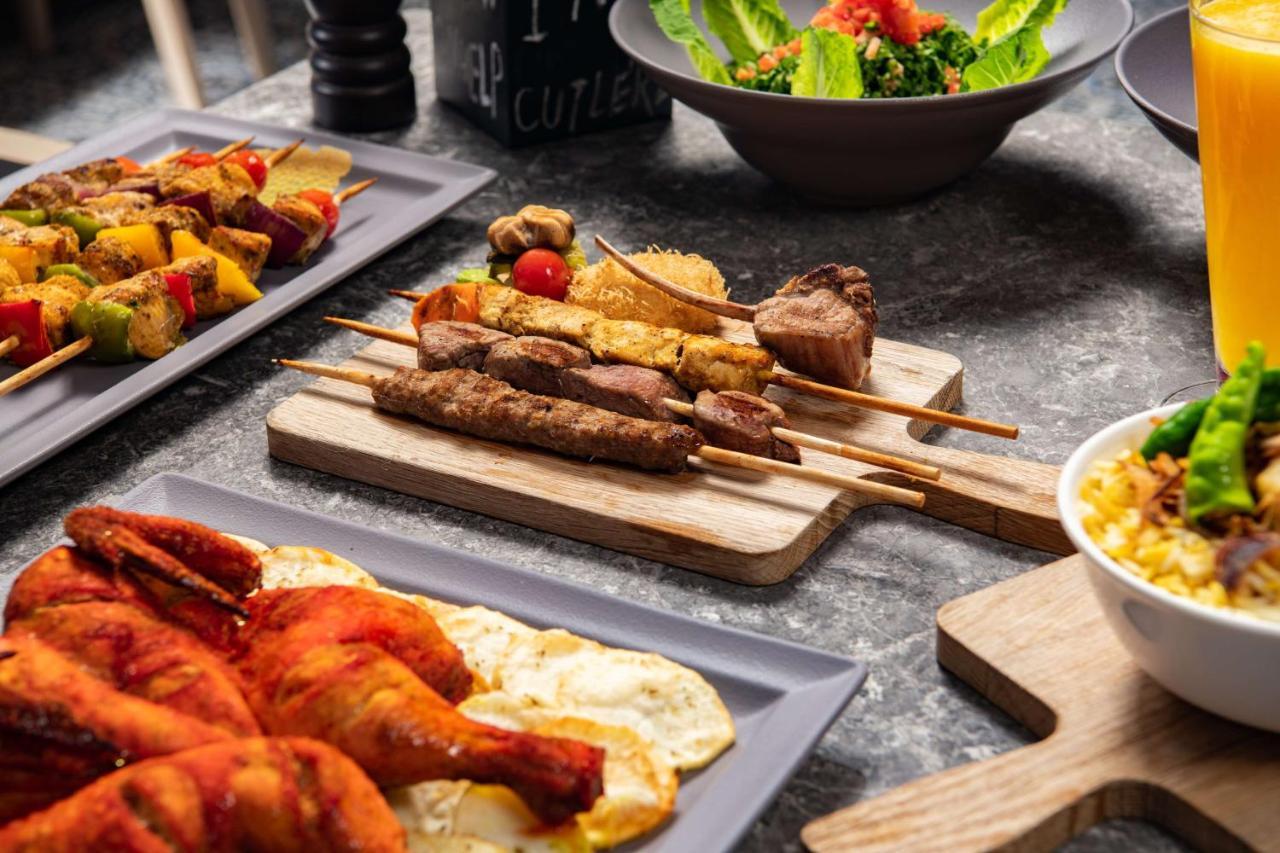 Park Inn By Radisson Makkah Aziziyah La Meca Exterior foto A buffet at a luxury hotel